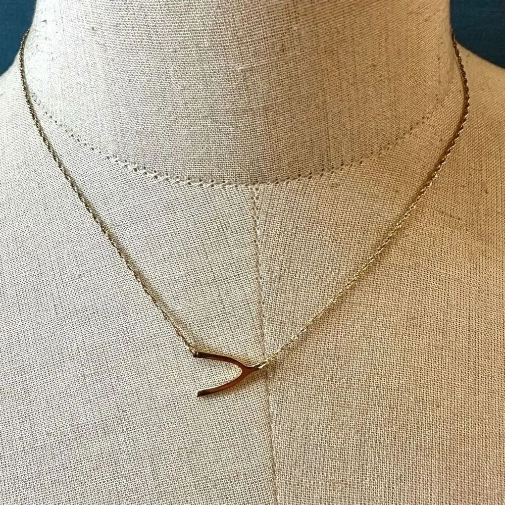 Sterling silver gold tone wishbone necklace